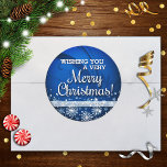 Personalised Merry Christmas (blue) Classic Round Sticker<br><div class="desc">Festive and fun personalised Christmas stickers with a pretty blue gradient background and a sprinkling of snow featuring the sentiment "wishing you a very Merry Christmas".  Perfect as gift labels,  envelope seals or for jar labels for homemade gifts.</div>
