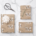 Personalised Merry Christmas Kraft Monogram   Wrapping Paper Sheet<br><div class="desc">A personalised "Merry Christmas" monogram design with a Xmas a kraft brown paper look background. An ideal festive custom design for the holiday season. Customise the monogram and make it your own!</div>