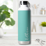 Personalised Minimalist Name Water Bottle<br><div class="desc">Simple yet stunning.  Personalise this water bottle with your name,  or a loved ones name.  A simple elegant script typography with a girly edge.  Change out the background and font colours to anything you want. Chic Trendy Simple Your Name Minimalist Water Bottle</div>