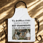 Personalised Newspaper Headline | Best Grandparent Apron<br><div class="desc">Make their time in the kitchen even more special with this fun and heartwarming "Grandhood Times" personalised apron! Styled like a newspaper front page, this custom apron features your favourite family photo, the grandkids’ names, and a bold headline declaring them the Best Grandparents Ever. A unique and practical gift for...</div>
