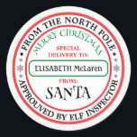 Personalised North Pole Santa Name Sticker<br><div class="desc">Custom Santa Claus Name Sticker — North Pole Workshop! ___________________________________ Delight kids and finish gifts with this Personalised North Pole Workshop Santa Name Sticker. This festive red-and-green square sticker features a cute Santa illustration—red hat, snowy beard—and customisable white script where you can add your child’s name or a short message...</div>