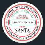 Personalised North Pole Santa Name Sticker<br><div class="desc">Custom Santa Claus Name Sticker — North Pole Workshop! ___________________________________ Delight kids and finish gifts with this Personalised North Pole Workshop Santa Name Sticker. This festive red-and-green square sticker features a cute Santa illustration—red hat, snowy beard—and customisable white script where you can add your child’s name or a short message...</div>