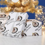 Personalised Photo Black Gold Merry Christmas Wrapping Paper<br><div class="desc">Give your holiday gift wrapping a personal touch with this custom design, featuring a pattern of black and gold Christmas ornaments and the phrase "Merry Christmas" in elegant black handwriting script. Add your family's name and replace the sample image (framed by the ornament and repeated as part of the pattern)...</div>