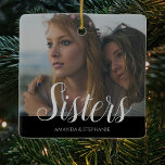 Personalised Photo Sisters Christmas tree Ceramic Ornament<br><div class="desc">A sisters photo christmas tree decoration can be changed to any relative. Featuring your favourite photograph,  the text 'Sisters' in a script font,  and their names over a black background.</div>