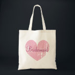 Personalised pink heart bridesmaid tote bags<br><div class="desc">Personalised pink heart bridesmaid tote bags. Beautiful vintage weather look design with elegant script text and custom name. Make one with name of bridesmaids,  flower girl,  maid of honour,  matron of honour,  mother of the bride etc. Cute design for wedding party,  bridal party or bachelorrette parties. Pastel pink colour.</div>
