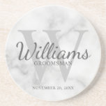 Personalised Script Groomsmen's name and Monogram  Coaster<br><div class="desc">Add a personal touch to your wedding with personalised groomsmen coaster. This coaster features personalised groomsman's name in grey classic script font style with wedding details in grey classic serif font style and monogram in light grey classic serif font style as background, on white marble background. Also perfect for best...</div>