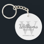 Personalised Script Groomsmen's name and Monogram  Key Ring<br><div class="desc">Add a personal touch to your wedding with personalised groomsmen keychain. This keychain features personalised groomsman's name in grey classic script font style with wedding details in grey classic serif font style and monogram in light grey classic serif font style as background, on white background. Also perfect for best man,...</div>