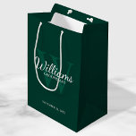 Personalised Script Groomsmen's name and Monogram  Medium Gift Bag<br><div class="desc">Add a personal touch to your wedding with personalised groomsmen gift bag. This gift bag features personalised groomsman's name in white classic script font style with wedding details in white classic serif font style and monogram in light emerald green classic serif font style as background, on emerald green background. Also...</div>