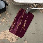 Personalised Signature Burgundy Red Gold Agate Luggage Tag<br><div class="desc">Personalise this elegant modern design with your name in vertical gold-coloured signature handwriting script on a burgundy red background with a border of burgundy watercolor agate trimmed with gold faux glitter. (To keep the swashes at the beginning and end of the name, replace only the letters, leaving the symbols in...</div>