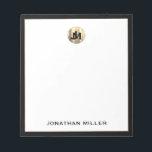 Personalised Simple Luxury Monogram Notepad<br><div class="desc">Elevate your note-taking with this personalised simple luxury monogram notepad. The design features two overlapping monogram initials in classic block typography on a brushed metallic gold emblem at the top, with your name in classic typography on a clean white background framed in black. Perfect for jotting down notes, to-do lists,...</div>