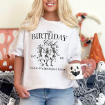 Personalised Spooky Halloween Group Birthday Party T-Shirt<br><div class="desc">Celebrate an October birthday in style with our Personalised Spooky Halloween Group Birthday Party T-Shirt! Perfect for Halloween enthusiasts, this shirt features a lively design of dancing skeletons that captures the festive spirit of the season. Tailor each shirt with the birthday honoree's age and your group's name, creating a unique...</div>