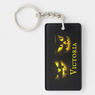 Personalised spooky yellow pumpkin face key ring