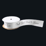 Personalised thank you wedding favour ribbon satin ribbon<br><div class="desc">Personalised thank you wedding favour ribbon. Elegant script typography for custom name and thank you message. Classy template for chic wedding party or bridal shower. Customisable colour with stylish fancy text.</div>