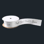 Personalised thank you wedding favour ribbon satin ribbon<br><div class="desc">Personalised thank you wedding favour ribbon. Elegant script typography for custom name and thank you message. Classy template for chic wedding party or bridal shower. Customisable colour with stylish fancy text.</div>