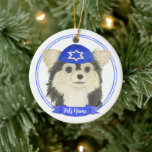Personalised Tricolor Chihuahua Hanukkah Ceramic Ornament<br><div class="desc">Celebrate your favourite mensch on a bench with personalised ornament! This design features a sweet illustration of a tricolor long haired chihuahua dog with a blue and white yarmulke. For the most thoughtful gifts, pair it with another item from my collection! To see more work and learn about this artist,...</div>