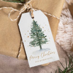 Personalised Watercolor Pine Tree Christmas Gift Tags<br><div class="desc">This personalised holiday gift tag features a watercolor pine Christmas tree accented with tiny gold stars,  and gold script Merry Christmas,  along with the family name.</div>