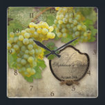 Personalised Wedding Anniversary Vineyard Decor Square Wall Clock<br><div class="desc">Personalised this design with your names and wedding date in the wine bottle label style frame for a custom touch. Ideal for wine lovers and those that are planning their wedding location at a winery, vineyard or wine country rustic venue. Exquisite original artwork painted by designer Audrey Jeanne Roberts in...</div>