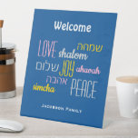 Personalised WELCOME LOVE JOY PEACE Jewish Pedestal Sign<br><div class="desc">Give your home a welcoming edge with this personalised Hebrew Welcome Pedestal Sign in tekhelet blue with CUSTOMIZABLE TEXT. The placeholder text is customisable, so you can change the heading and add your family name. The words LOVE JOY PEACE are also written in Hebrew (and colour coded). Suitable for Hanukkah,...</div>