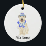 Personalised Wheaten Terrier Christmas Blue Scarf  Ceramic Ornament<br><div class="desc">I am in love with this beautifully detailed watercolor illustration of a smiling wheaten terrier with little blue ski hat and scarf outfit! Personalise these ornaments and make the nice list this year! For the perfect presents, pair it with a matching item from the collection for a thoughtful housewarming, bridal...</div>