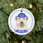 Personalised Wheaten Terrier Hanukkah Yarmulke Ceramic Ornament<br><div class="desc">Celebrate your favourite mensch on a bench with a personalised ornament! This design features a sweet illustration of a soft coated wheaten terrier with a blue and white yarmulke. For the most thoughtful gifts, pair it with another item from my collection! To see more work and learn about this artist,...</div>