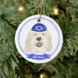 Personalised White Cream Doodle Dog Hanukkah Ceramic Ornament<br><div class="desc">Celebrate your favourite mensch on a bench with personalised ornament! This design features a sweet illustration of a white or cream doodle dog with a blue and white yarmulke. For the most thoughtful gifts, pair it with another item from my collection! To see more work and learn about this artist,...</div>