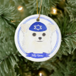 Personalised White Long Haired Chihuahua Hanukkah Ceramic Ornament<br><div class="desc">Celebrate your favourite mensch on a bench with personalised ornament! This design features a sweet illustration of a white long haired chihuahua dog with a blue and white yarmulke. For the most thoughtful gifts, pair it with another item from my collection! To see more work and learn about this artist,...</div>