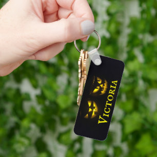 Personalised yellow on black creepy pumpkin faces key ring