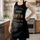 Personalized 50th Birthday 1976 Black & Gold Apron<br><div class="desc">Celebrate five decades of fabulousness with our stylish and personalized 50th Birthday Apron! This elegant black apron features a bold "SETTING THE STANDARDS SINCE" design with a prominent "1976" (or your chosen year) in gold. Below, you can customize it with a name like "ELIZABETH" and a heartwarming phrase: "ADMIRED BY...</div>