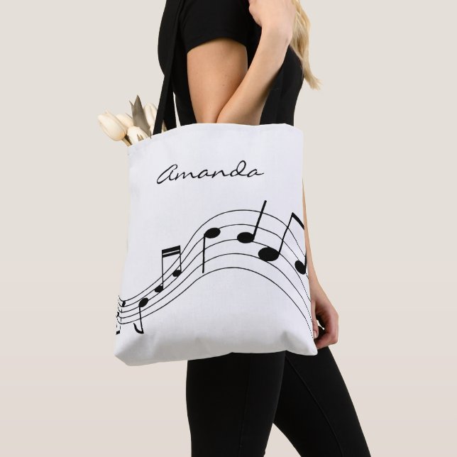 Personalized music notes on a chic white backdrop tote bag (Close Up)