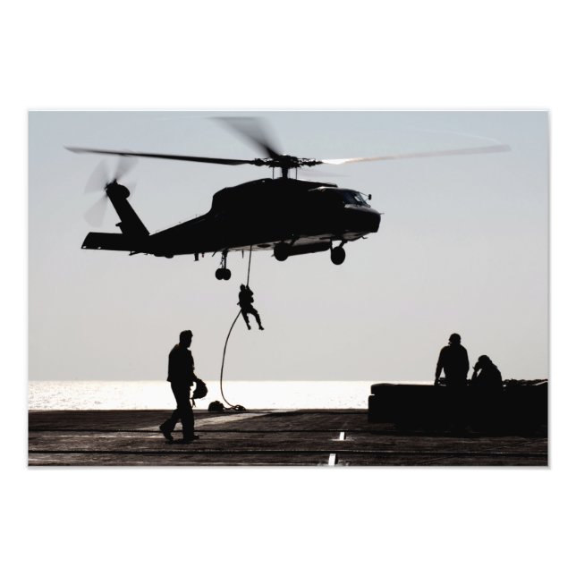 Personnel fast-rope out of an SH-60F Photo Print (Front)