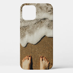 Person's feet on seashore iPhone 12 case