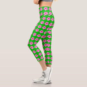 "Petal Serenity: Pink Hibiscus on a Green Canvas Capri Leggings