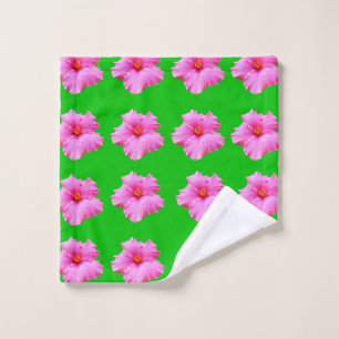 "Petal Serenity: Pink Hibiscus on a Green Canvas Wash Cloth