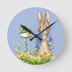 Peter the Rabbit checking bird house Round Clock