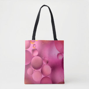 photo, bright oily drops in water with colorful ba tote bag