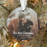 Photo Chalk Script Our First Christmas Engaged Ornament<br><div class="desc">Did you get engaged this year? Add a memory to your tree with this modern keepsake ornament featuring a simple yet elegant design with the message "Our First Christmas Engaged" in white chalk script along with the year, over your favourite photo. Add the same photo to both sides or a...</div>