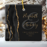Photo First Christmas Married Black Agate Gold Ceramic Ornament<br><div class="desc">This elegant modern ornament features a black watercolor agate design trimmed with faux gold glitter. Customize the gold-colored text on an off-black background, with the names of the bride and groom in whimsical handwriting calligraphy over a large gray ampersand. The words "First Christmas Married" appear in serif font along with...</div>