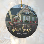 Photo First Christmas New Home Gold Script Ceramic Ornament<br><div class="desc">Commemorate your first Christmas in your new home with this beautiful modern keepsake ornament. The text reads "First Christmas in our new home, " with the words "new home" in elegant gold faux foil script. Replace the sample image with a photo of your new house and add your family's last...</div>