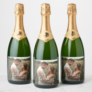 Photo Modern Script We're Engaged Engagement Party Sparkling Wine Label