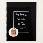 Photo motivational quote black 2026 planner<br><div class="desc">An elegant black background.  A white frame and the motivational quote,  text: Be Brave,  Be Bold,  Be You. Personalise and add your name,  year and a photo,  white letters.  Add your own photo.</div>