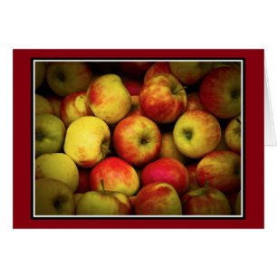 Photo of a Bushel Of Yellow and Red Apples