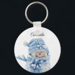 Photo of a Cute Snowman in Winter - Christmas Key Ring<br><div class="desc">A key chain with a cute photograph of a little snowman. Standing outside in the winter with snow falling all around. This cute little guy is dressed up in blue knitted hat and scarf.</div>