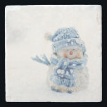 Photo of a Cute Snowman in Winter - Christmas Stone Coaster<br><div class="desc">A stone coaster with a cute photograph of a little snowman. Standing outside in the winter with snow falling all around. This cute little guy is dressed up in blue knitted hat and scarf.</div>
