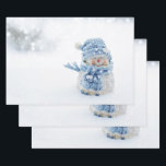 Photo of a Cute Snowman in Winter - Christmas  Wrapping Paper Sheet<br><div class="desc">Wrapping paper sheets with a cute photograph of a little snowman. Standing outside in the winter with snow falling all around. This cute little guy is dressed up in blue knitted hat and scarf.</div>