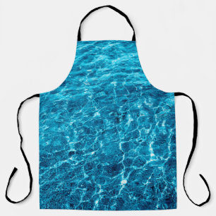 Photo of a macro bubbling blue clear sea water apron