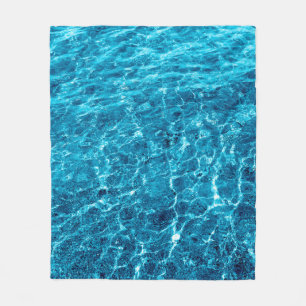 Photo of a macro bubbling blue clear sea water fleece blanket