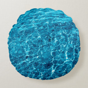 Photo of a macro bubbling blue clear sea water round cushion