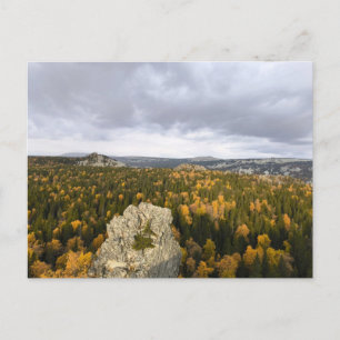 photo of a mountainous autumn forest, mountains, holiday postcard