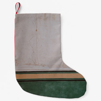 Photo of brown concrete pavement small christmas stocking