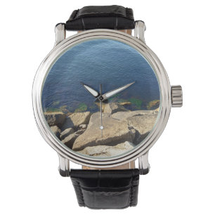 Photo of Deep Blue Atlantic Ocean Rocky Cliff Watch